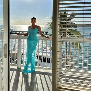 NBD Leighan Gown in Turquoise. With sequin-embellished fabric.